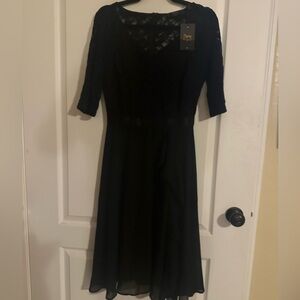 NWT Miss May Black 3/4 Sleeve Lace V neck Flowy Dress.     Size M